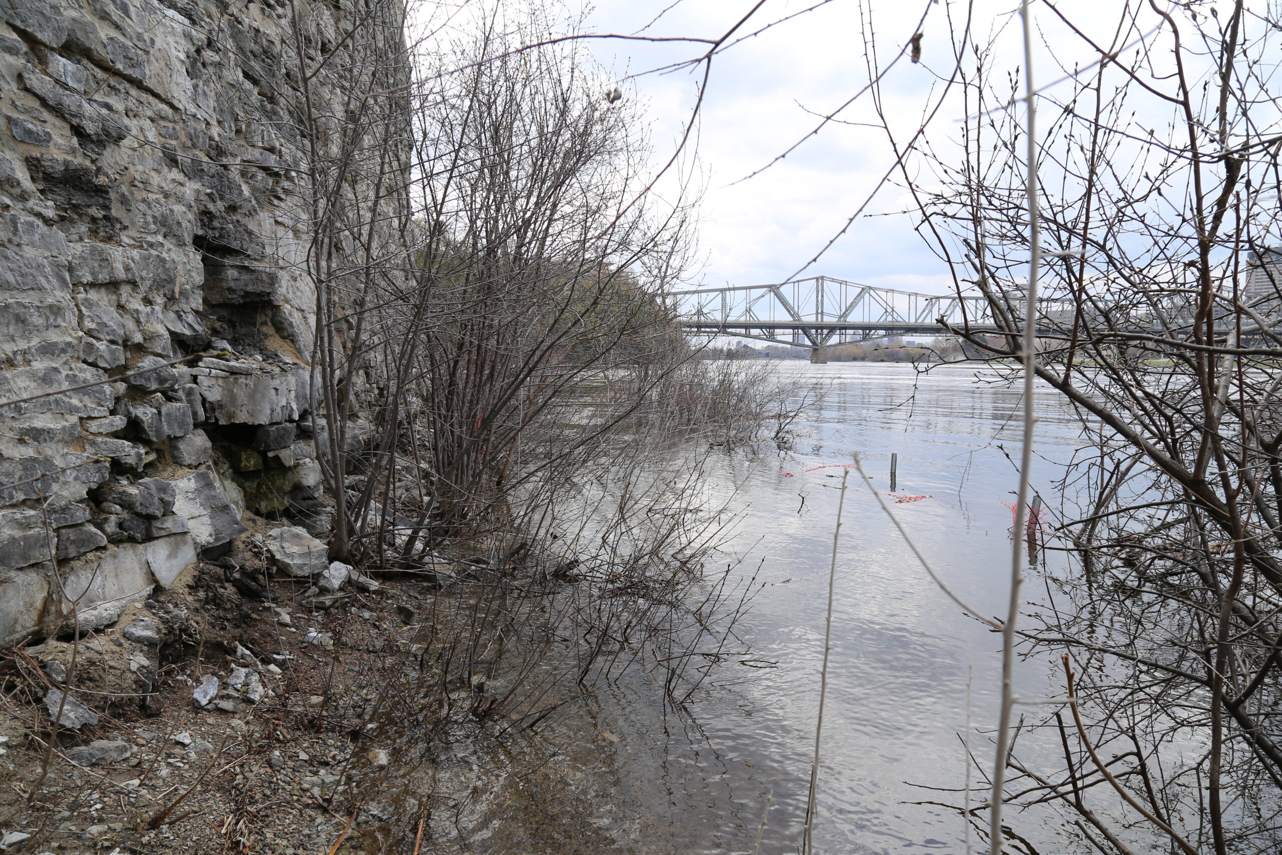 View of the Ottawa River and stone retaining wall.